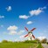 A windmill in a bucolic countryside